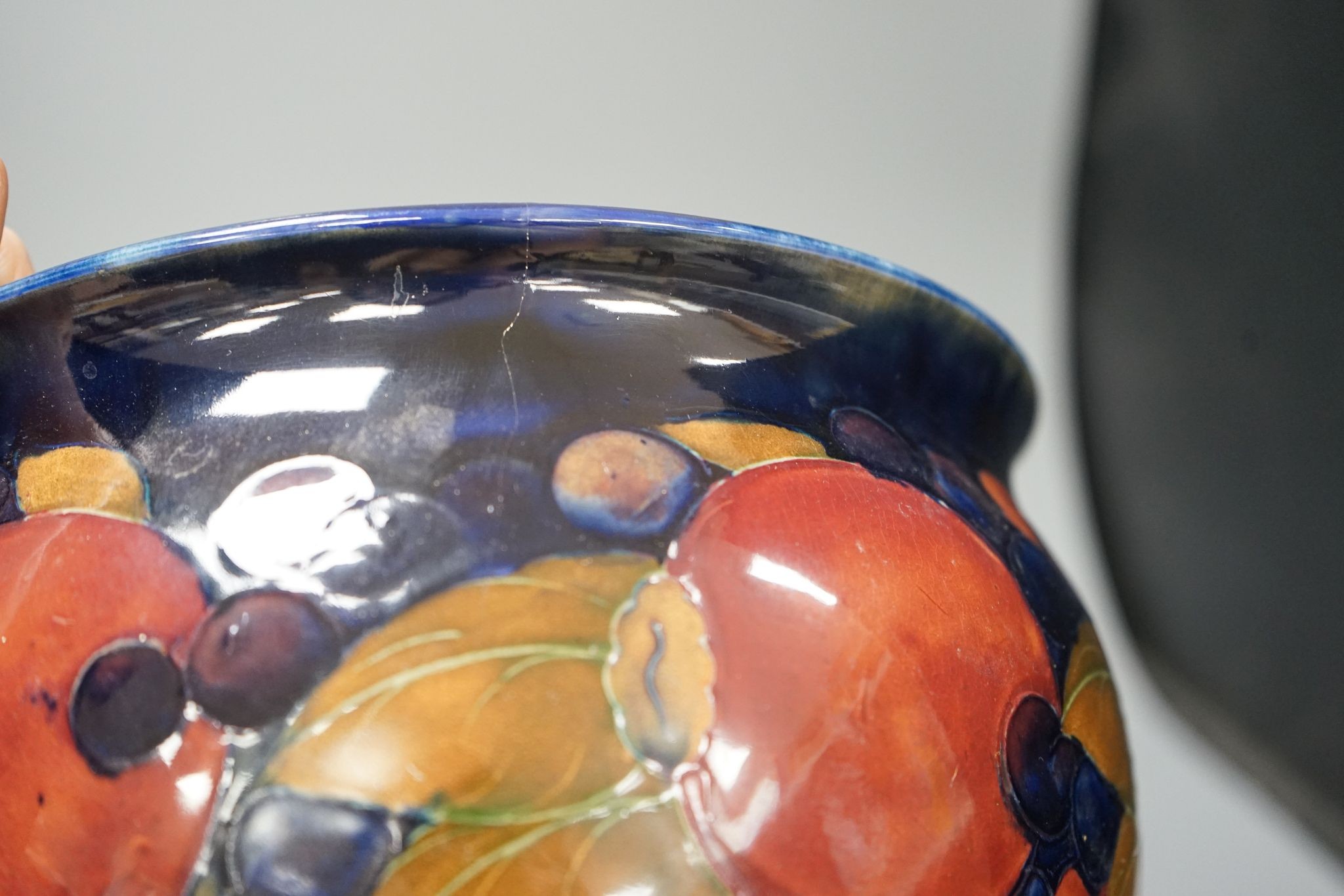 A Moorcroft jardiniere, on hammered pewter plinth, 22cm